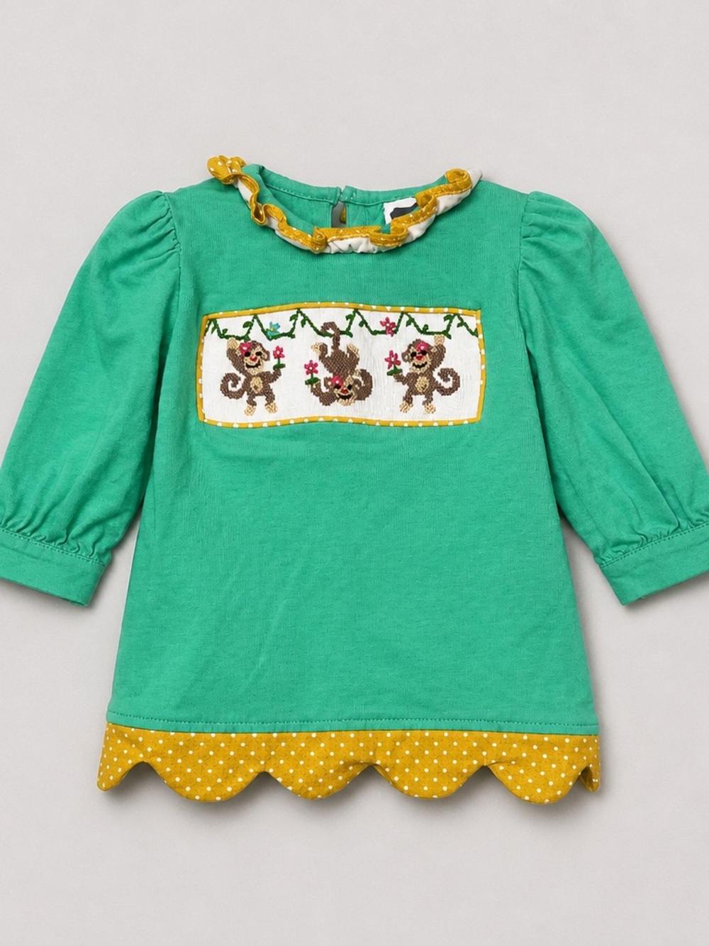 True Hand green and musty smocked and monkey embroidered long sleeve dress